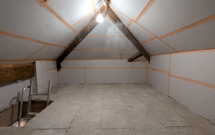 A spacious and well-lit loft storage